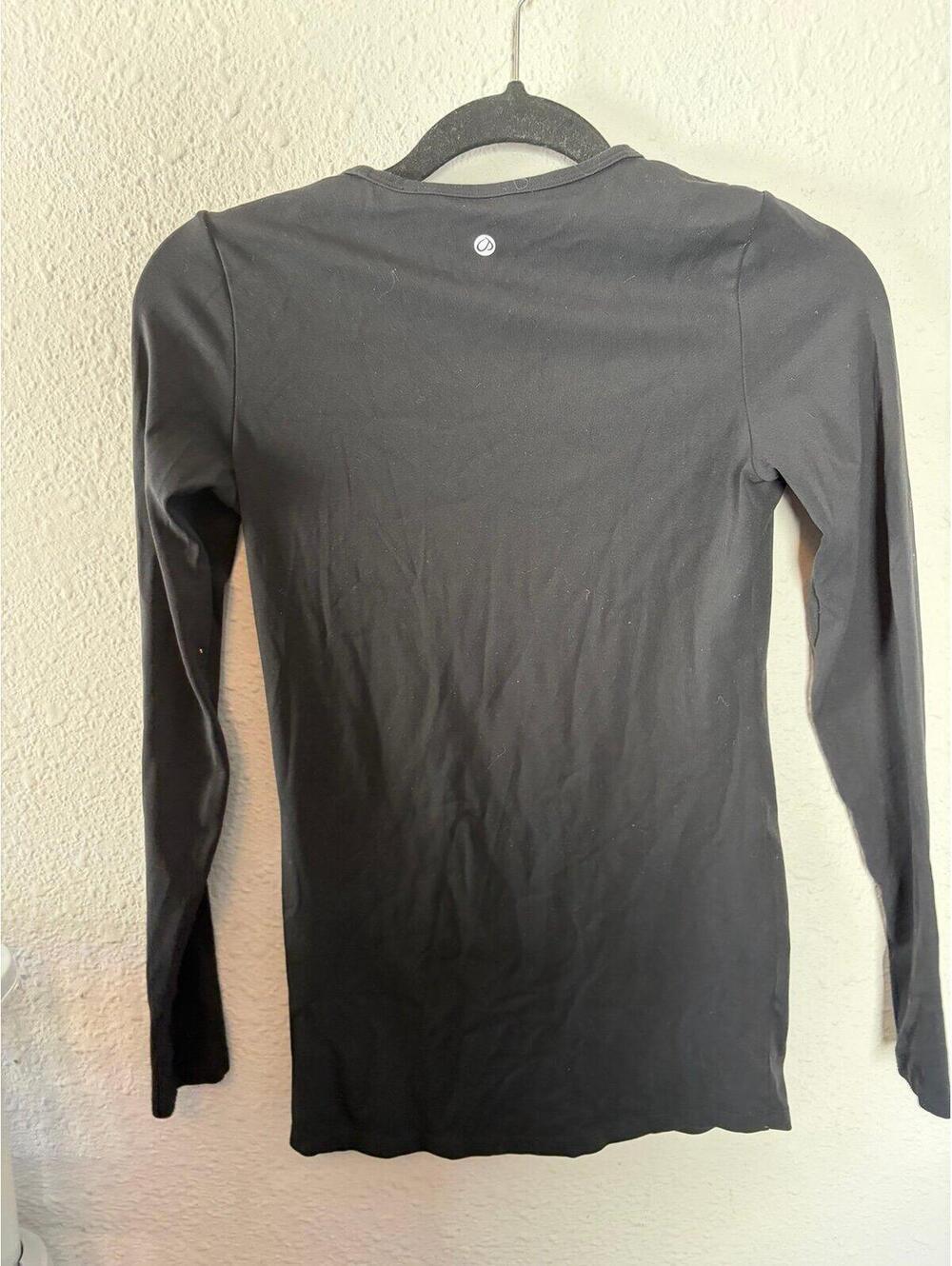 CRZ Black Long Sleeve. Best for an XS for looser fit and S for tight fit. Pit to